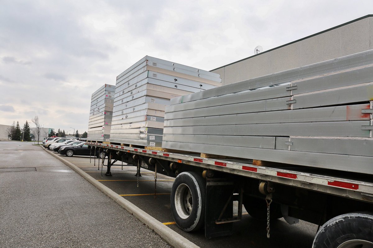 ArcelorMittal_D's tweet photo. All the pieces are coming together for @HabitatHamilton ‘s newest steel house project in #HamOnt!! Flatbed trailers are loaded up &amp; ready to make their way to the site with wall panels, floor panels and steel roof trusses manufactured by Interbuild, using our steel. https://t.co/y7q0t3Z5NX