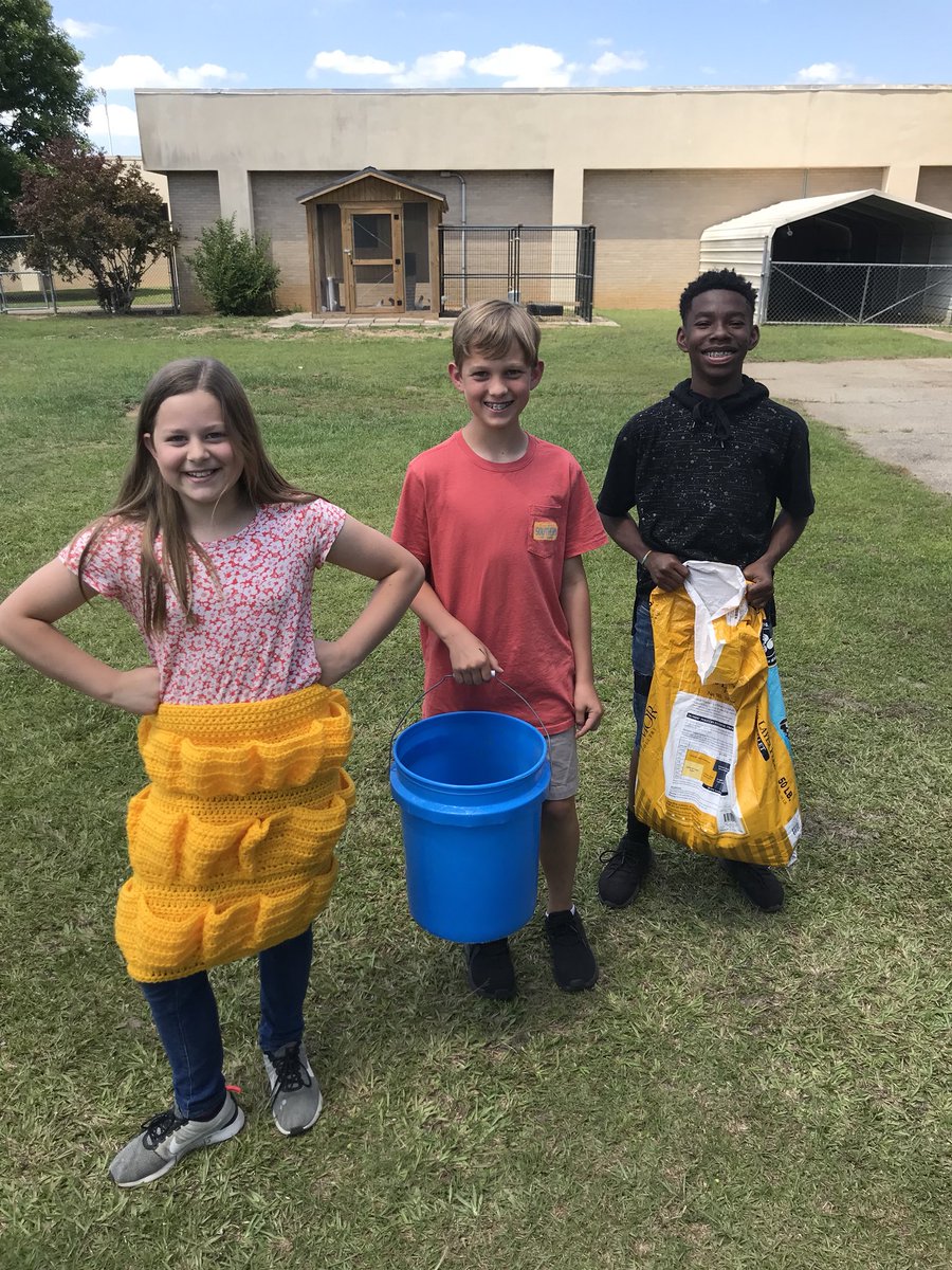 LeeCountyAgEd's tweet photo. LCMS-E Professional chicken feeders and egg collectors! @LCMSEast #eggapron https://t.co/JKT33caXXk