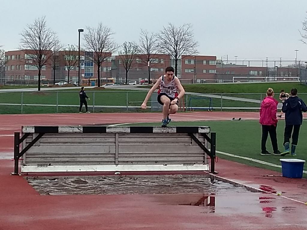 OLMC_athletics's tweet photo. A rainy track meet! Julian Lobo, Luke Patrick &amp; Davis Fowler in Steeple Chase!  #runjump https://t.co/DgrZnFYIUW