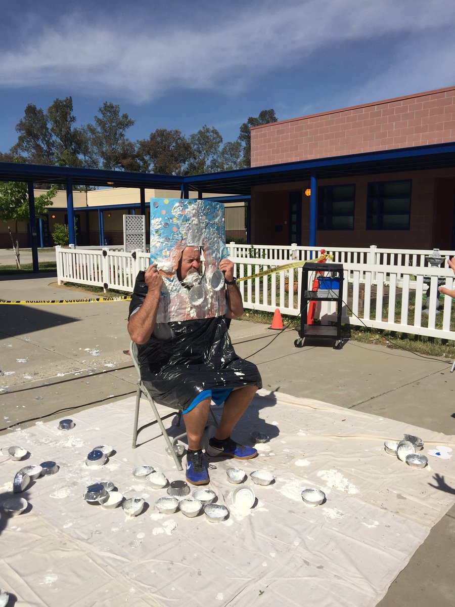 HartHuskies's tweet photo. Mr. Fenton getting a pie at the Hart carnival!  @PrincipalAtHart https://t.co/xHsKyCjvRW