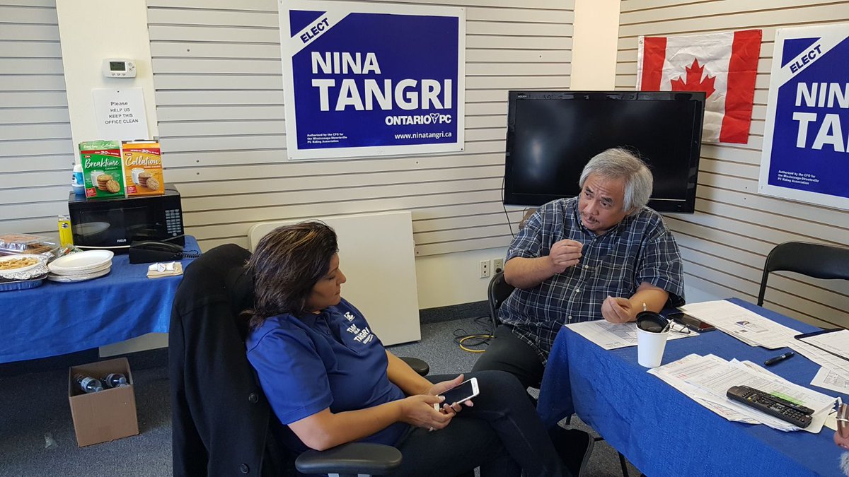 ninatangri's tweet photo. Crazy wind and rain will not stop us from #DoorKnocking #Mississauga #Streetsville.  We will get #OntarioBackOnTrack #PCPO. https://t.co/1W3V0DlGK0