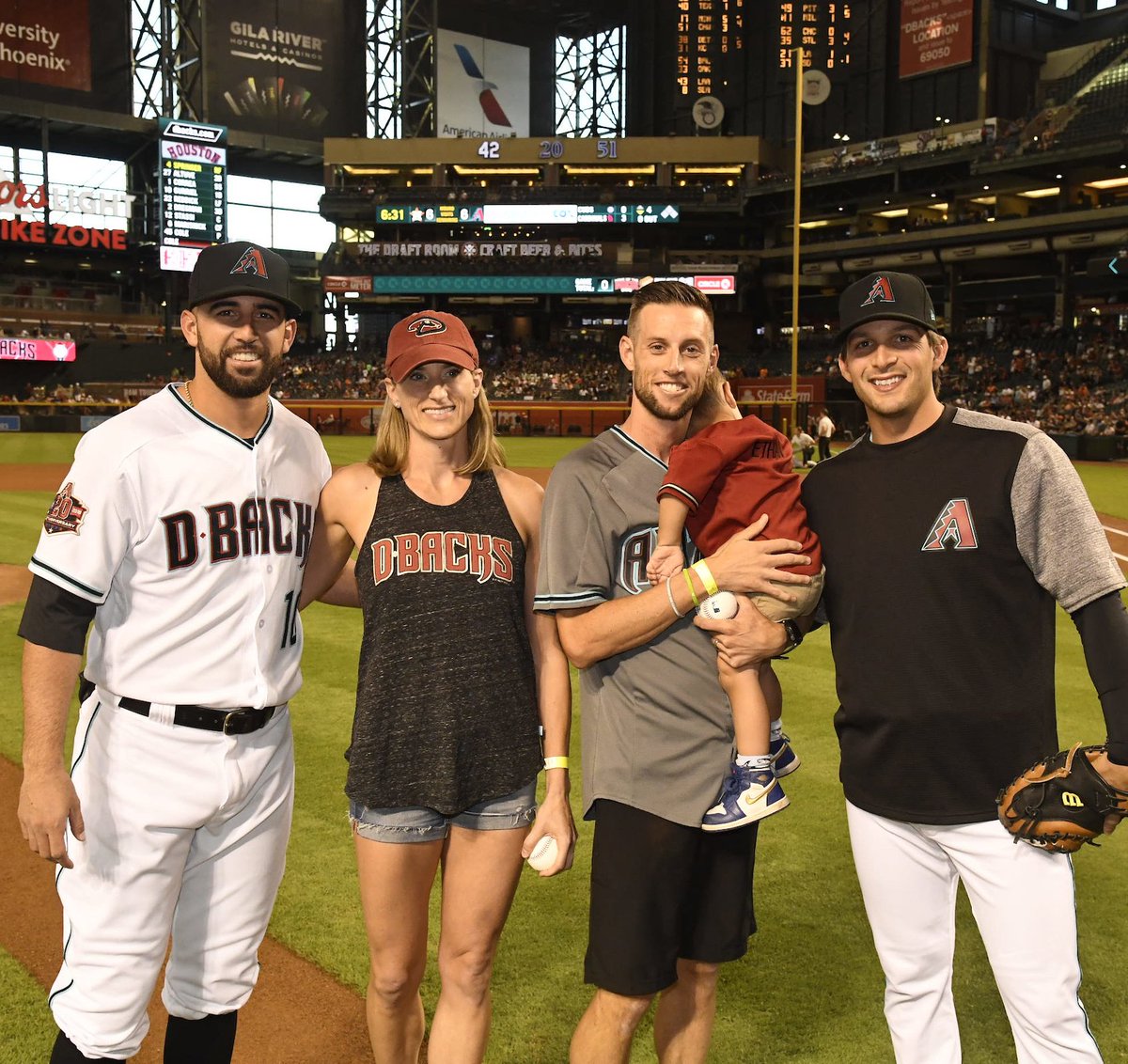 Dbacks's tweet photo. Tonight's ceremonial first pitches were tossed by the top female and male finishers of this year's #DbacksRace Against Cancer: Alanna Bernacchi and Brandon Southall. 🏆🏆 https://t.co/YfzElUV8gR