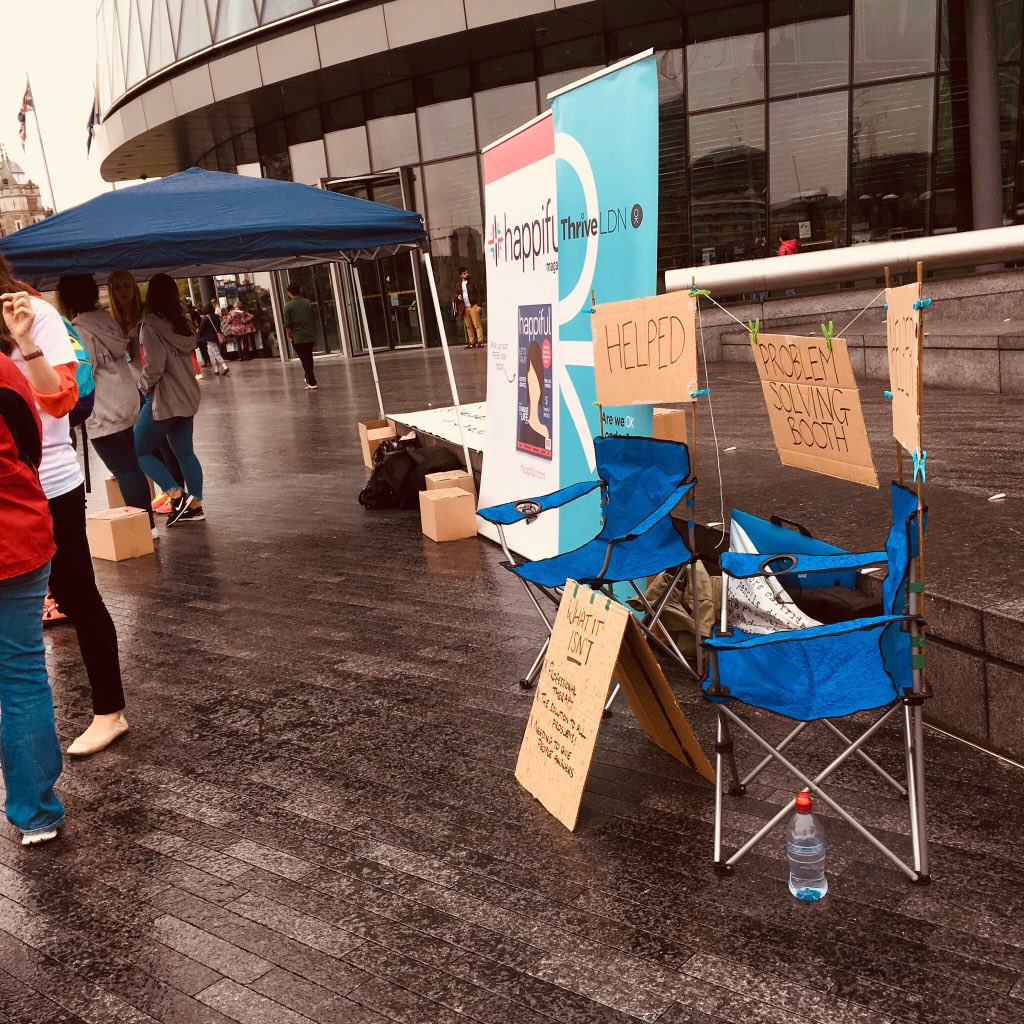 ThriveLDN's tweet photo. Enjoying chatting to everyone taking part in #WalkingOutofDarkness today with a #problemsolvingbooth outside City Hall. Undeterred by the drizzle with @claspcharity & @happifulhq ☔️💪 #mentalhealth #OKLDN https://t.co/4d1U5IH1om