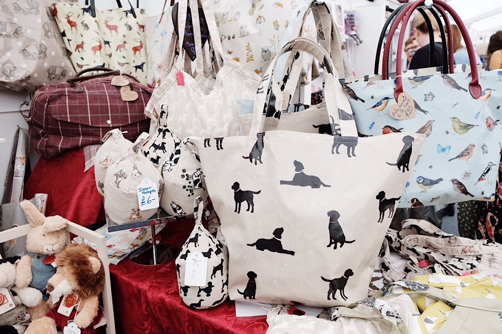 H_madeFestival's tweet photo. We're back in the Shopping Village and love these prints from Country Bags and Moore. The lobster print is perfect for sunny beach days 🌊☀️ https://t.co/xwYlSKaIh9