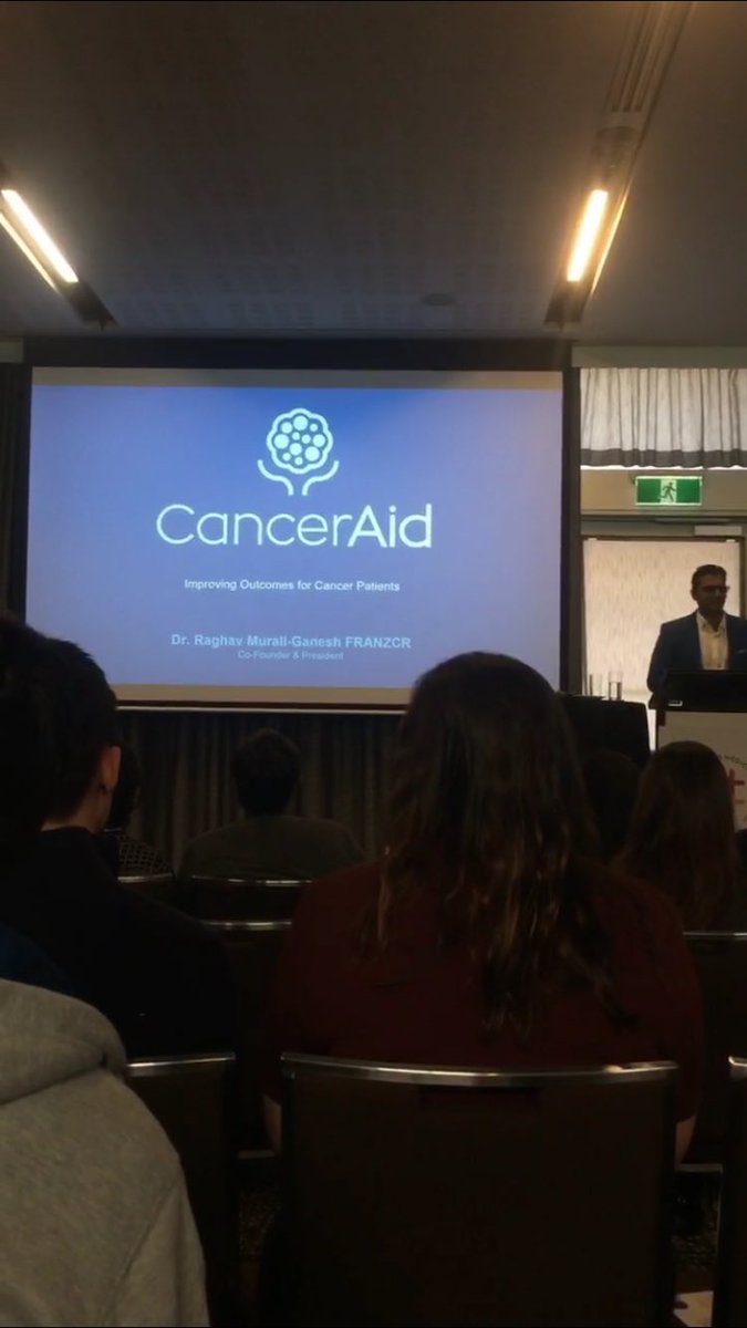 Osara_Health's tweet photo. Dr Raghav Murali-Ganesh presenting his keynote From Treatment to Technology: How our Clinical Experience Helped Shape CancerAid at #CCIM2018 in Sydney Today 🙌📲#HealthTech #CreativeCareers #makingadifference @CCIM2018 https://t.co/oBpOzsLxxZ