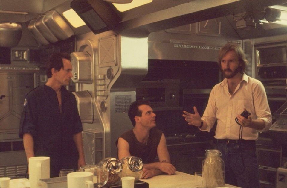 Happy 78th birthday to Lance Henriksen, seen here with Bill Paxton and James Cameron on the set of \Aliens\ (1986). 