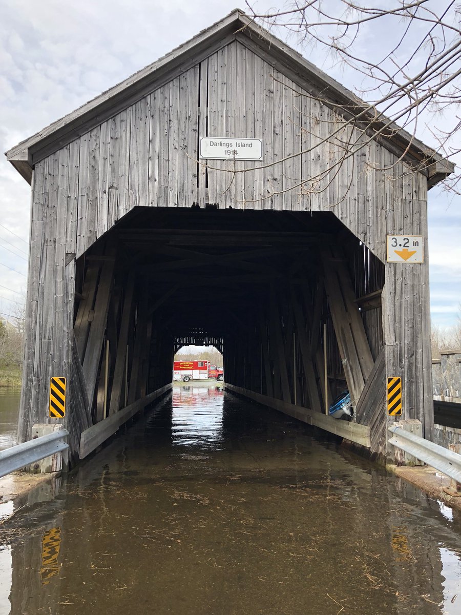 The water has made it into our lovely old covered bridge on Darlings Island  😬😔#NBFlood2018 #coveredbridges