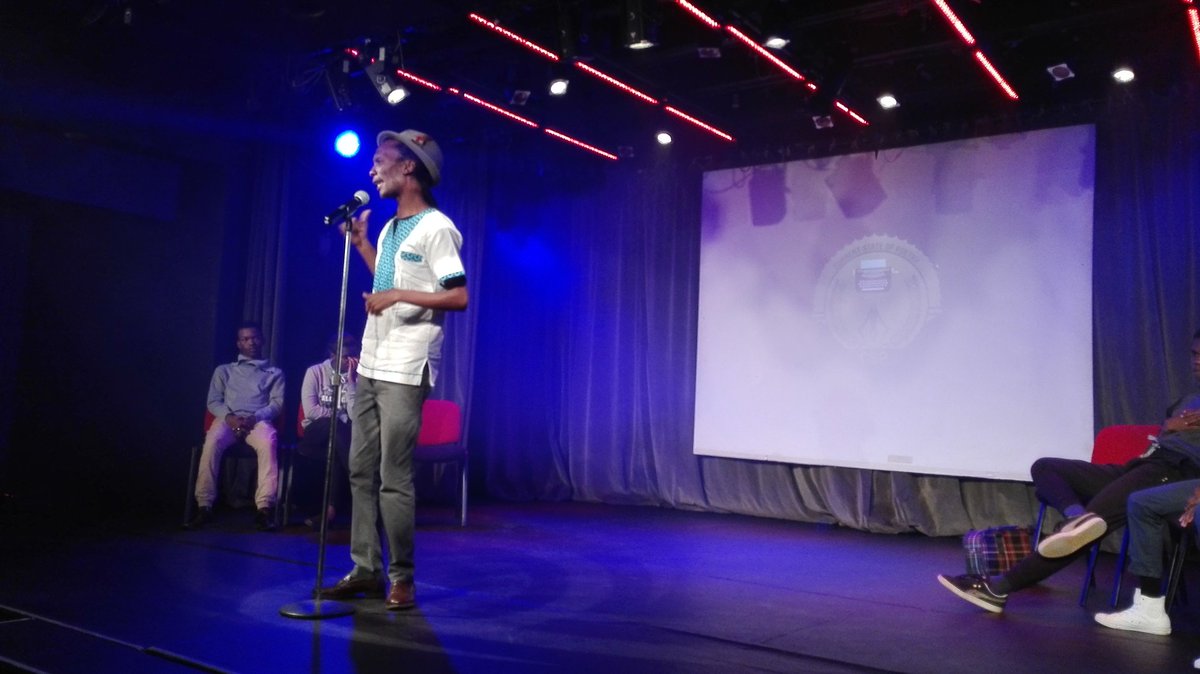 CSofPoetry's tweet photo. Xolani performing 'Addiction'. We are on bout 2 of #CSPSlam @joburgtheatre. https://t.co/jWk77Hp19u