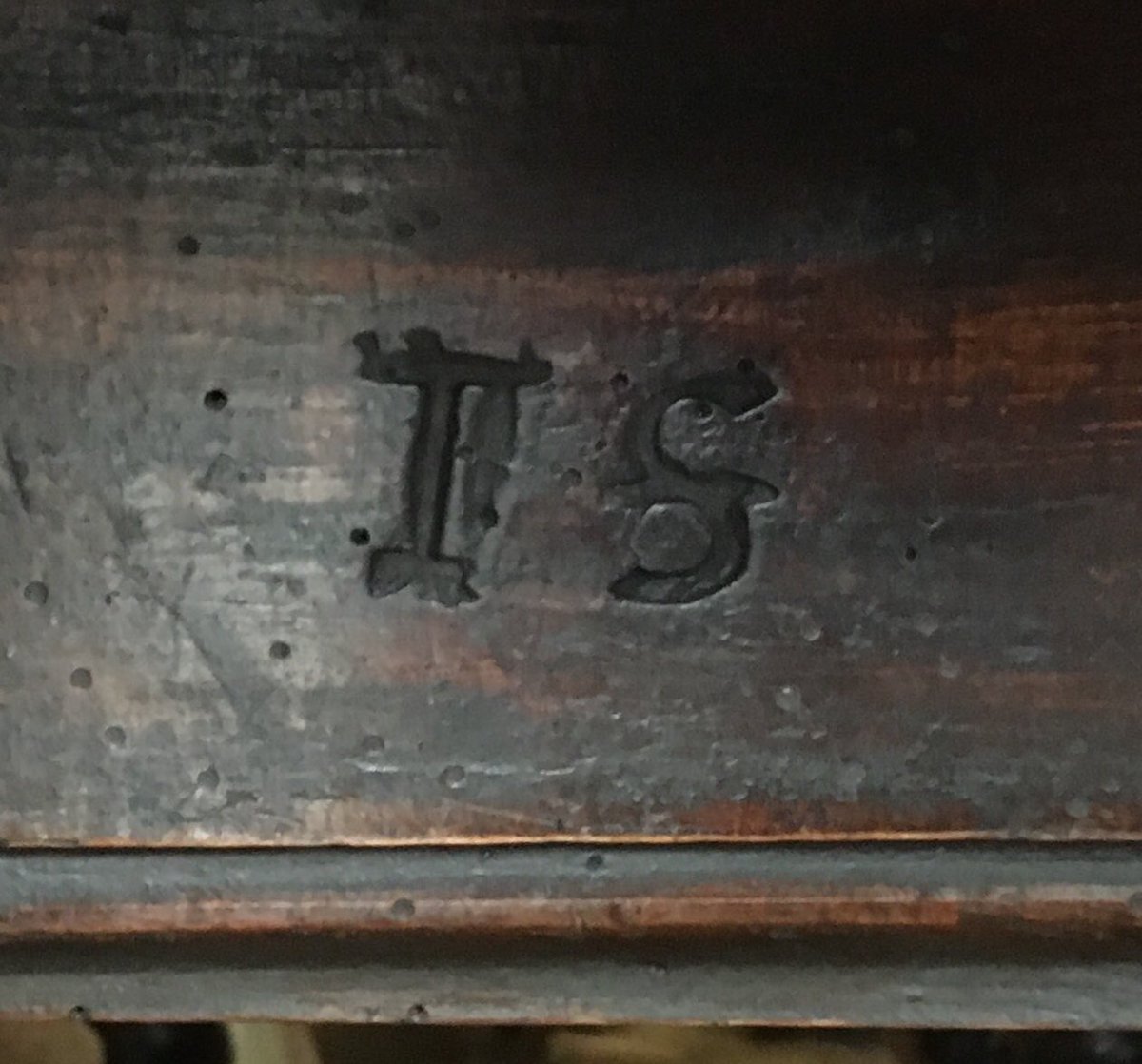 Interesting ownership initials on a 17thC gateleg table applied with a branding iron.