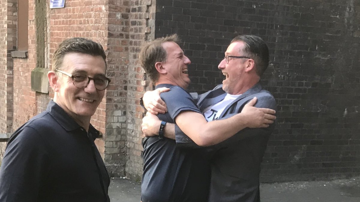 MichaelDiPaola's tweet photo. This is what an old mate turning up to surprise @simoncalderbank at #TwitFaced looks like. Magic moment. https://t.co/r0VfL5KYxU