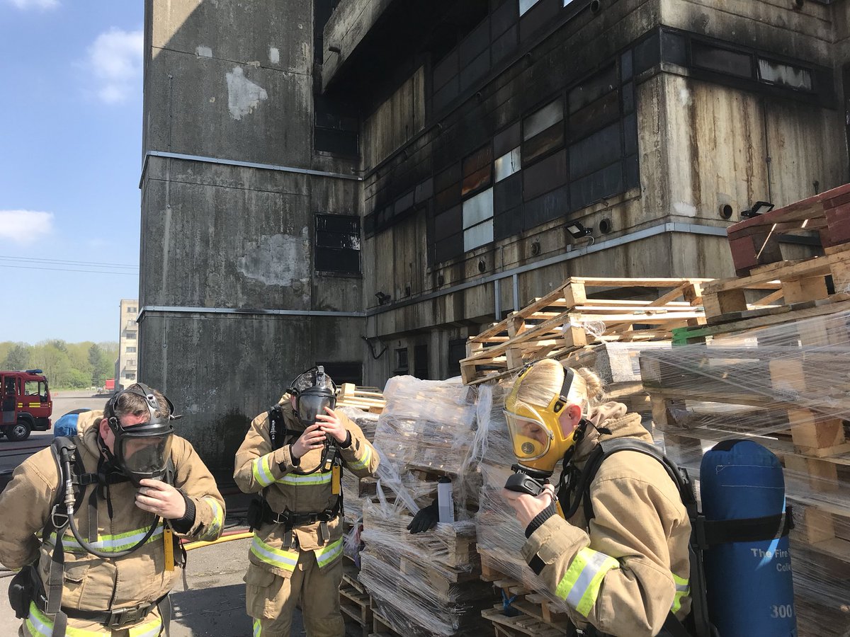 Apprentice Barlow dons her breathing apparatus set to deploy to the 4th floor of a university accommodation block