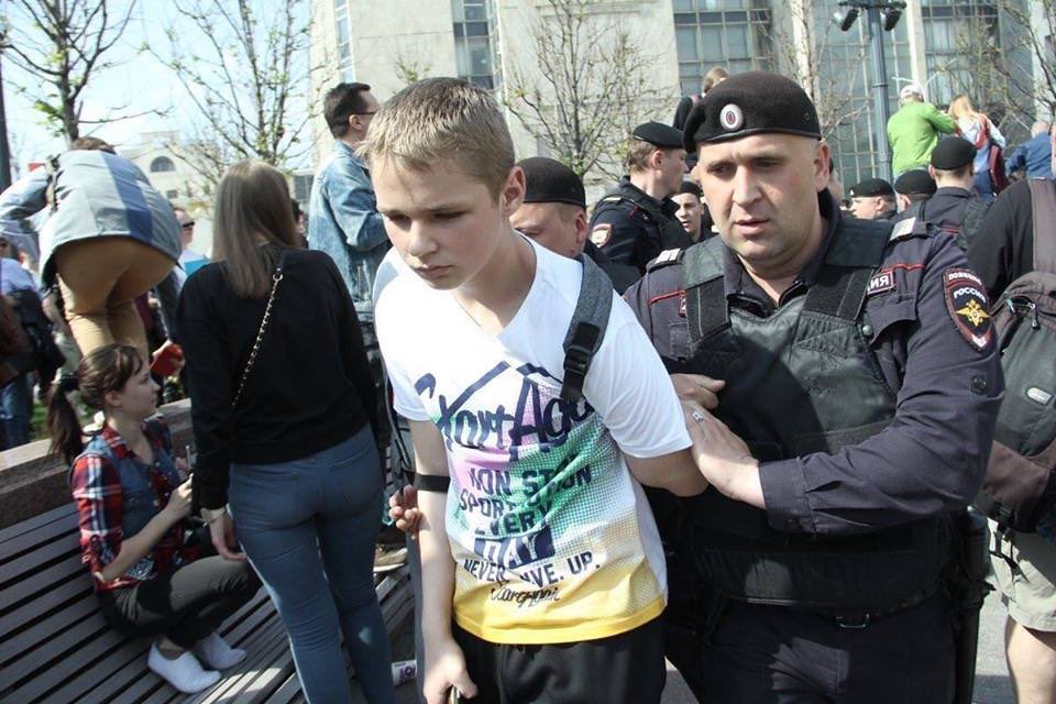 Kids and peace people and press detained on street with hard police and army power