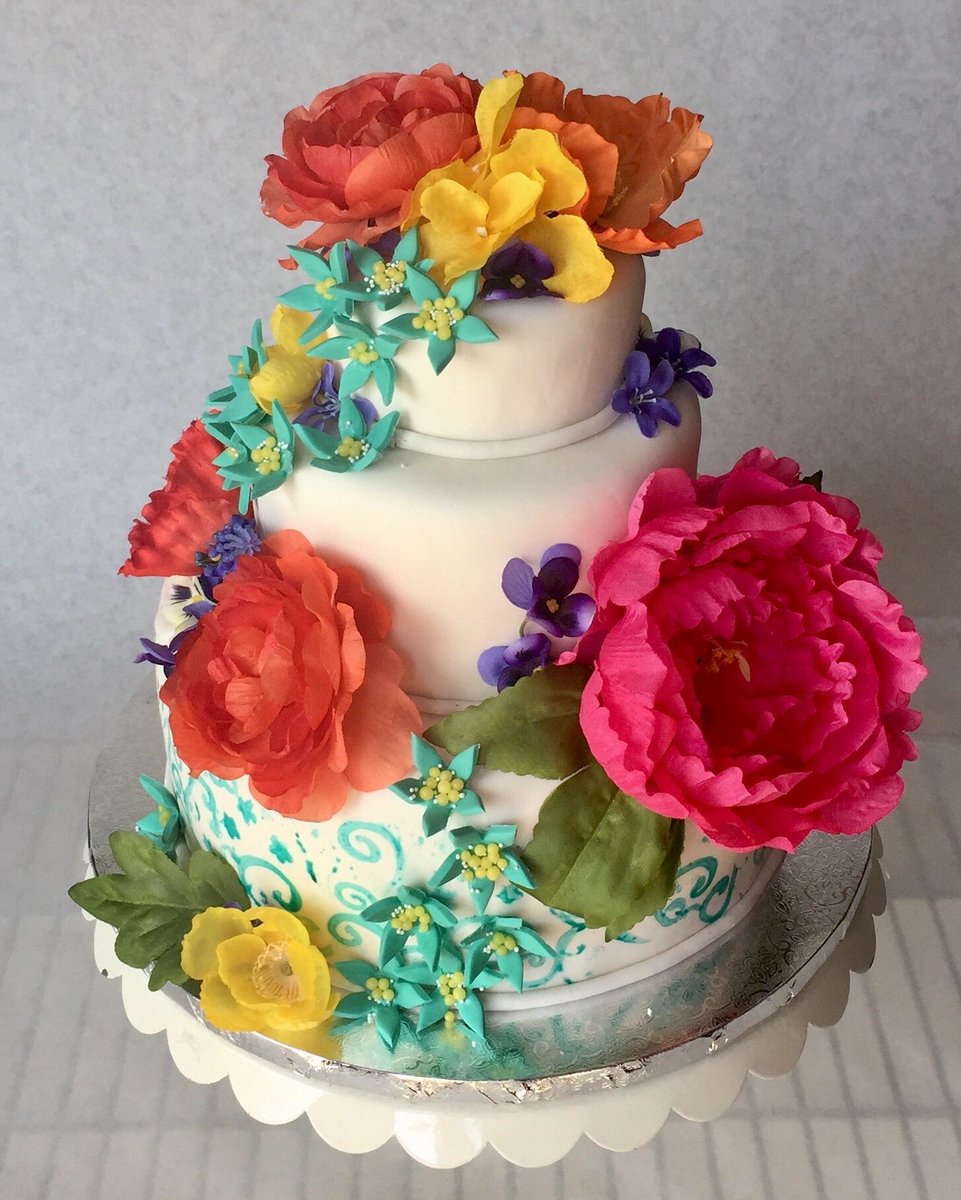 zestbakery's tweet photo. Floral cinco de mayo cake! #glutenfree #glutenfreecake https://t.co/XMlFLqO8x7
