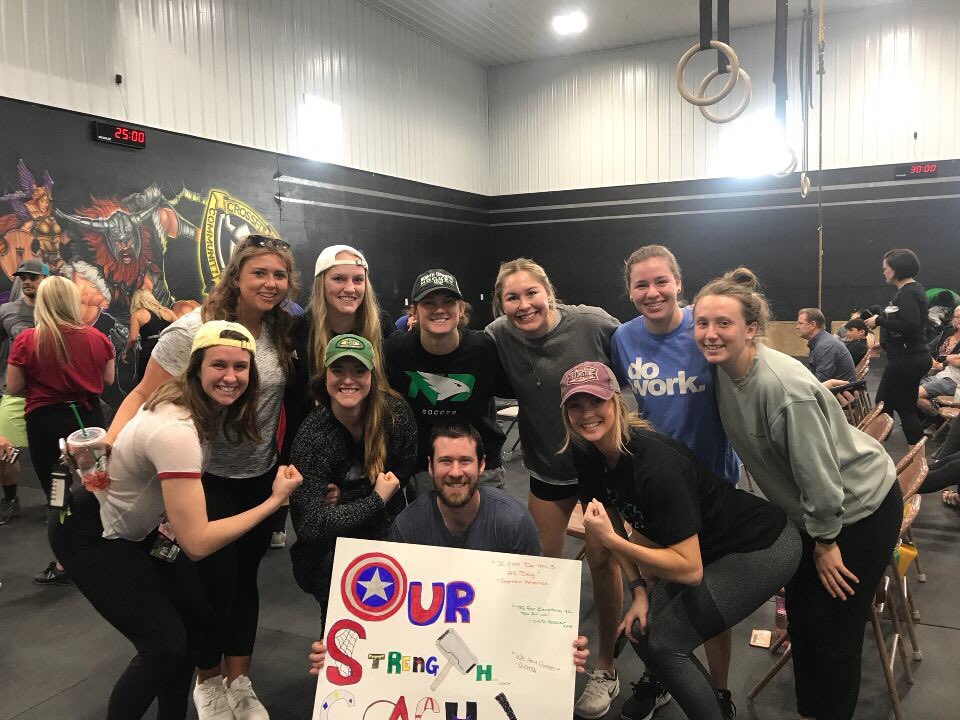 seanfan2Z's tweet photo. I always talk about impacting people in a positive way. These girls have made such an impact on my life. Thank you @UNDsoccer for the coolest sign and the loudest cheers today! #ImpactSomeone https://t.co/NdYs6HMzms