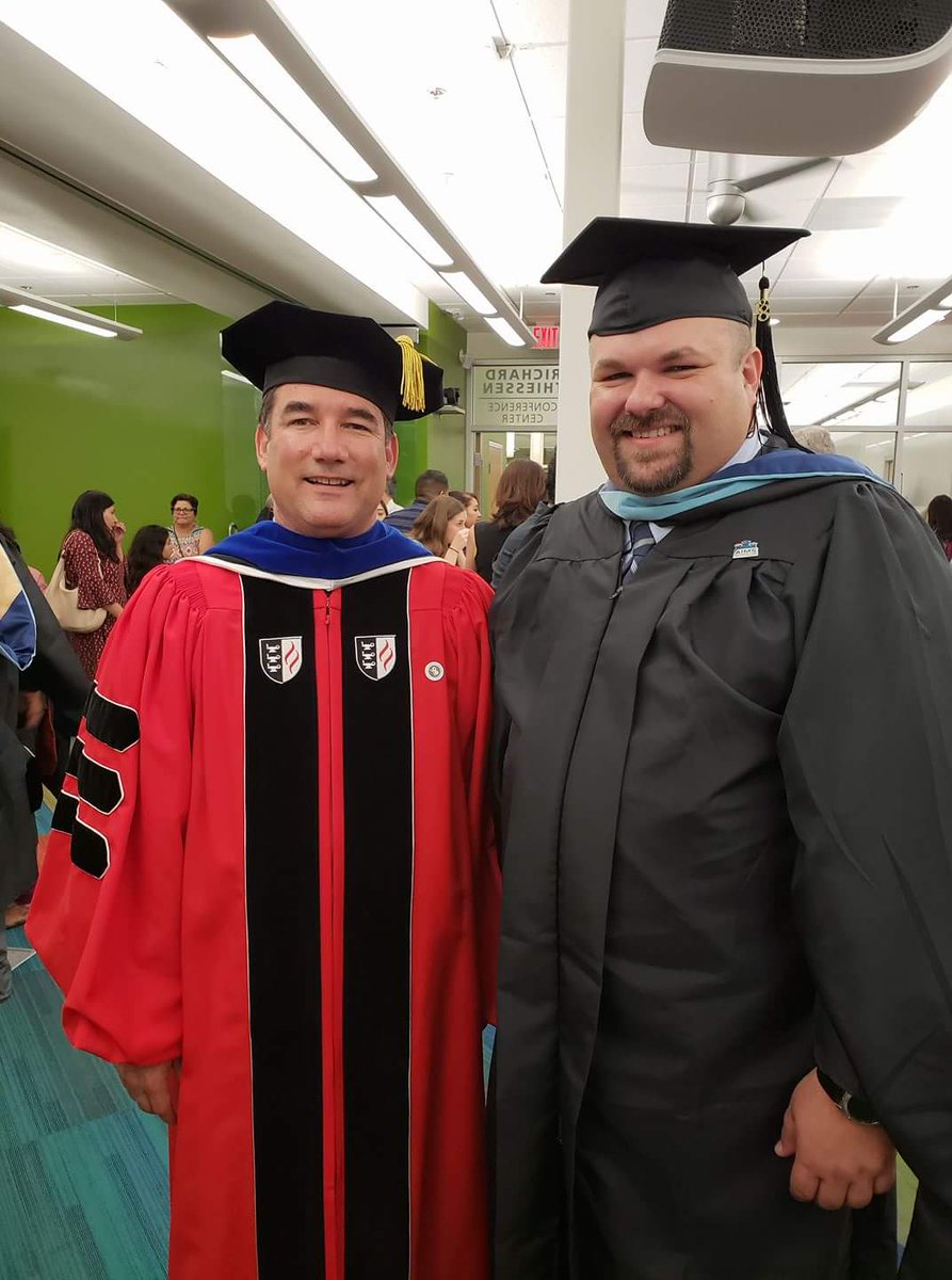 SchusterMath's tweet photo. Another pic from @aimsed Reception, this time featuring my fantastic advisor Dr. Chris Brownell. #fpugrad https://t.co/EjG7IAXfoz