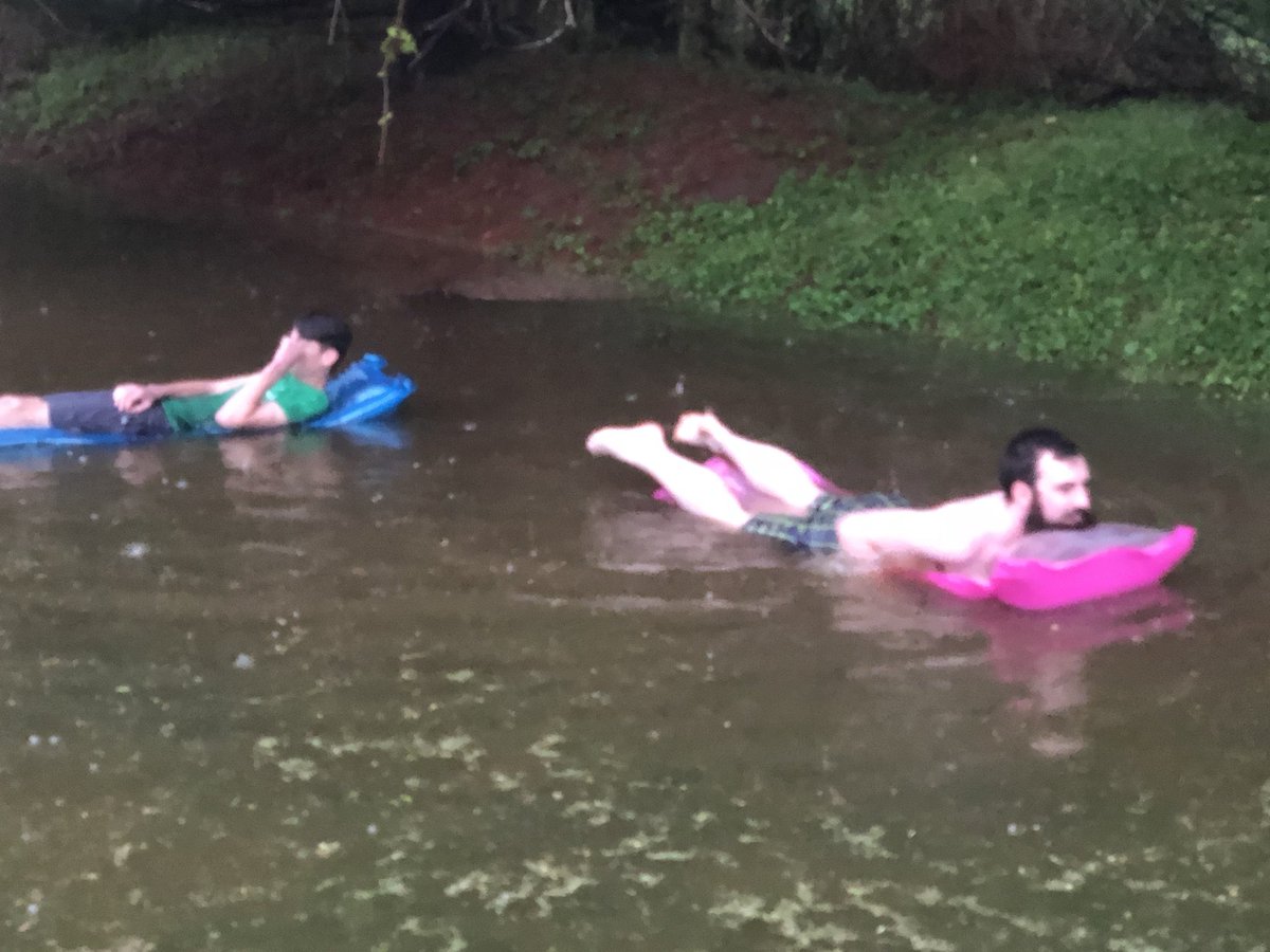 GMCPastor's tweet photo. Just enjoying a #redneck May Day. #Floating in the backyard on a super rainy day. #Floatchallenge https://t.co/sgAWUbdRey