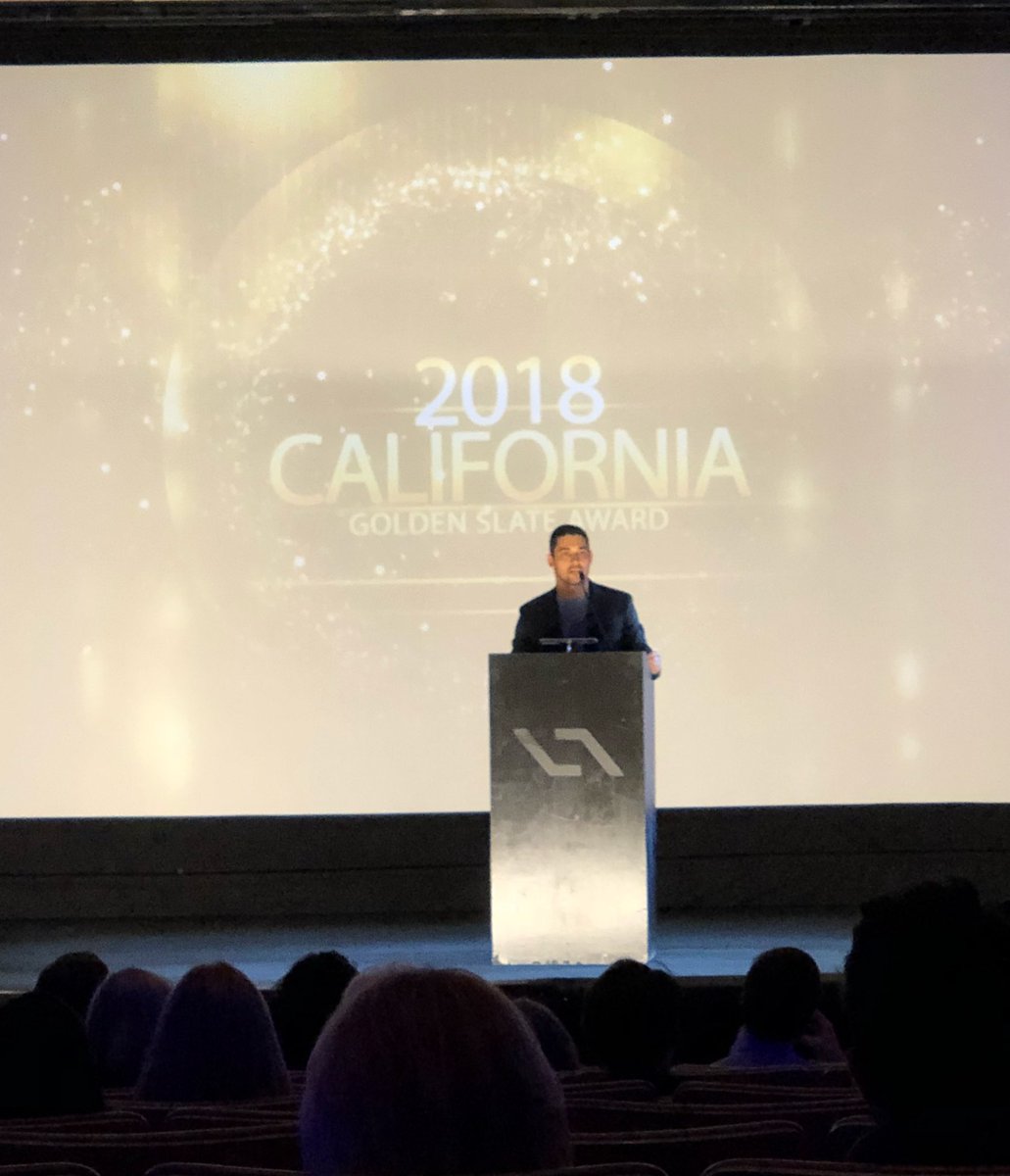 It’s time for the Golden Slate Award presentation by <a href="/WValderrama/">Wilmer Valderrama</a>! #FilmCA #FICC18