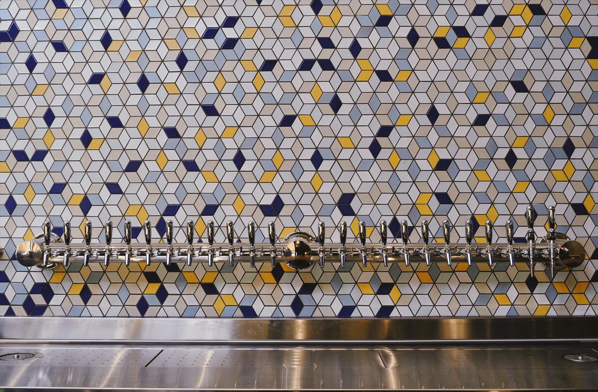 As we get closer to opening we’ll be giving you a sneak peek of the inside of Urban Roots. We’re really excited about the way the tile wall behind our bar turned out. Each tile was picked out of the box and placed at random which means there is no repeating pattern.