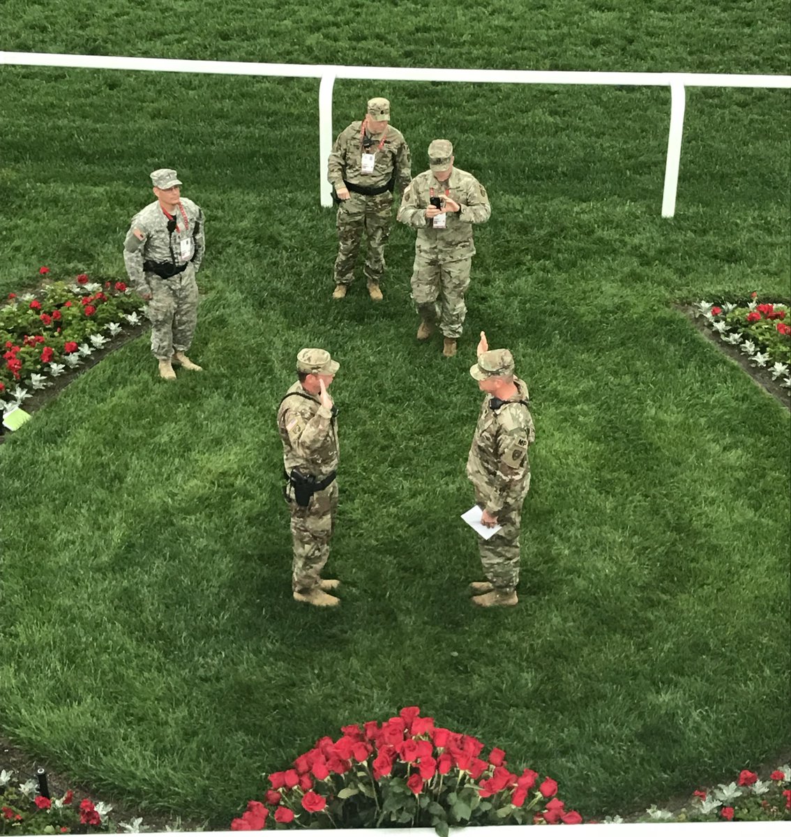 LMPD's tweet photo. Security and Traffic simply isn't possible without the help from our nations finest men and women in our military. In the first picture, SSG Purviance from the 940th MP Company re-enlisted today for 6 more years! Congrats! #LMPD #KYNG #940TH #HOOAH https://t.co/BBqk2k8x3u