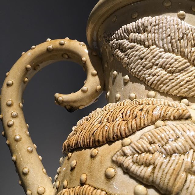 KateMaloneTweet's tweet photo. jug handle.  Clay.  #tefaf2018 #adriansassoon #jug #crewelwork #spriggs #handles https://t.co/sttR94CJEO https://t.co/dtE8FRRWpm