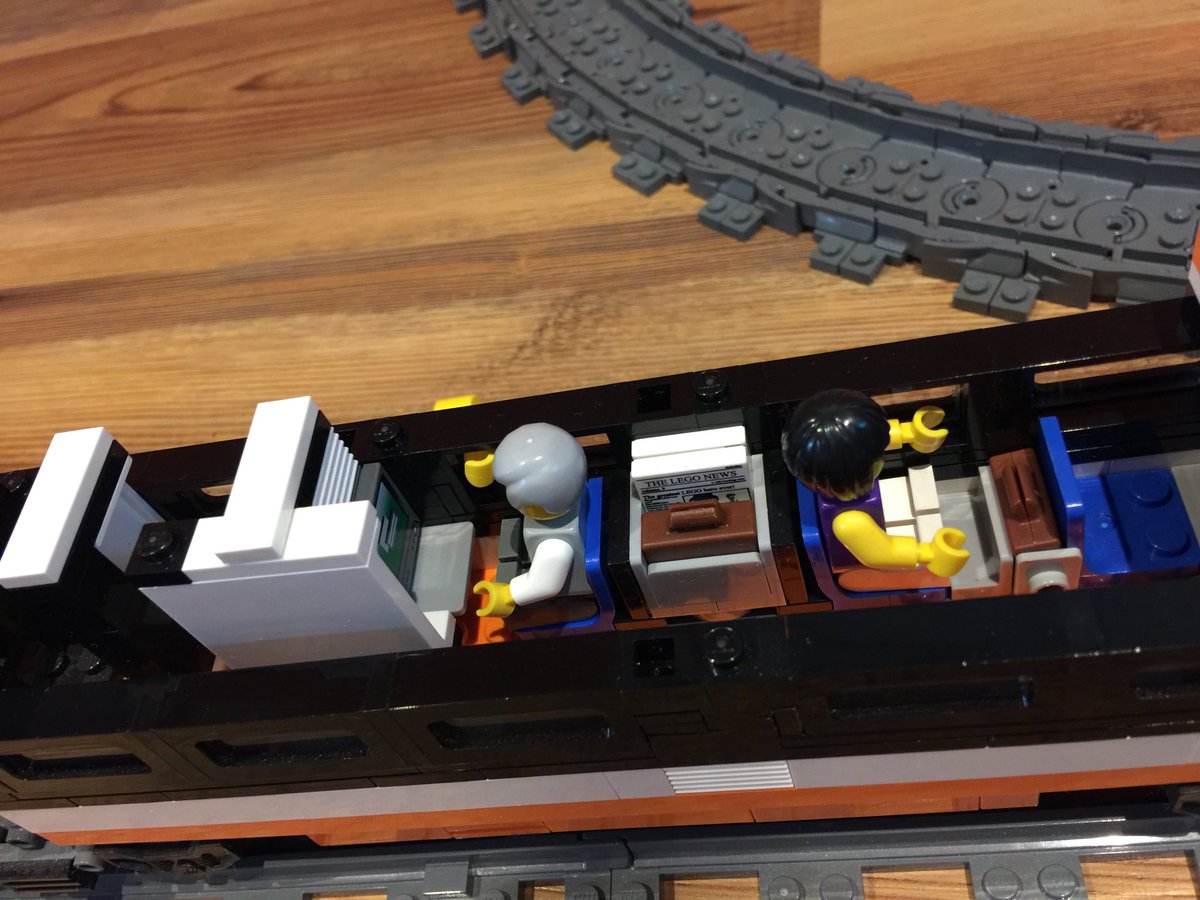 ahung's tweet photo. Still pics of the @LEGO_Group train setup with station.๐ Thatโs a bathroom with sliding door in the 2nd pic!๐3rd pic is obviously the bar ha ha. Driver is female or transgender, no idea.๐ #horizonexpress https://t.co/ESrkmmN56T