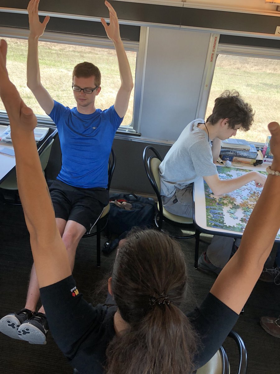 GAYWhistler's tweet photo. #3GaysOnATrain do Yoga while rolling across Canada π¨π¦ π #springitonwithpride #venturebeyond @via_rail @RyanThomasWoods @citizenjtravel #ilovegay #gaytravel https://t.co/TZIydwAp96