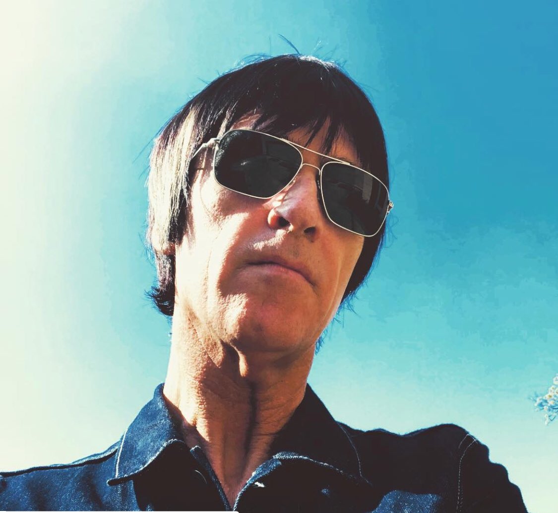 Johnny wears Oliver Peoples Clifton