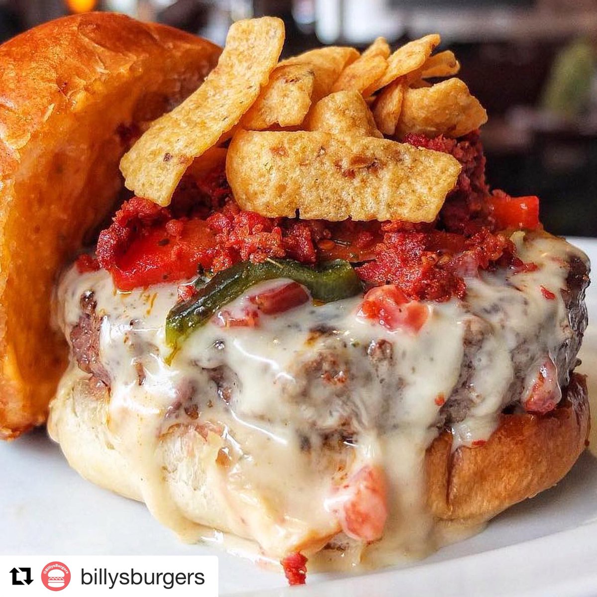 SandwichAmerica's tweet photo. We loved Frito Pie growing up; @RevCiancio @omgitsbomb and @5napkinburger are giving you a chance to try this #burger at #NYBurgerWeek...don’t miss it! https://t.co/RjBYQ0xrh6 #SandwichoftheDay 🤯 https://t.co/2hiQ9G1pCj