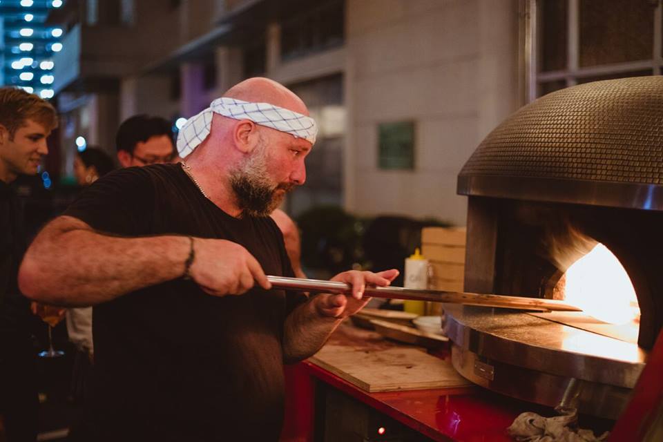 The concentration of Paolo Vitaletti cooking up a feast at our launch. The dedication of a true passionate chef. Now, can I have another slice?
