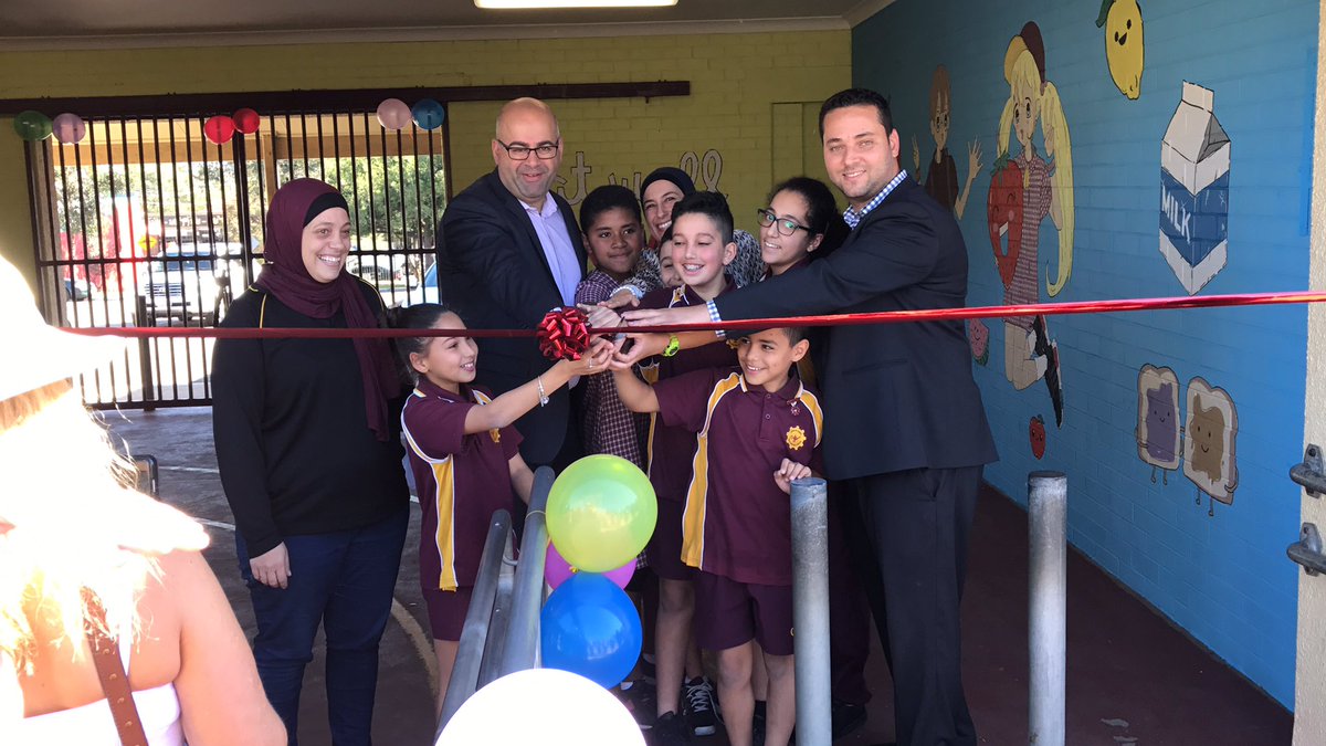 HelenMorgani's tweet photo. Former @ChulloraPS student & VC, now artist paints our canteen in a #P&C funded initiative #proud #OurStudentsAreStars #colour @dketas https://t.co/nC2GgsIvfu