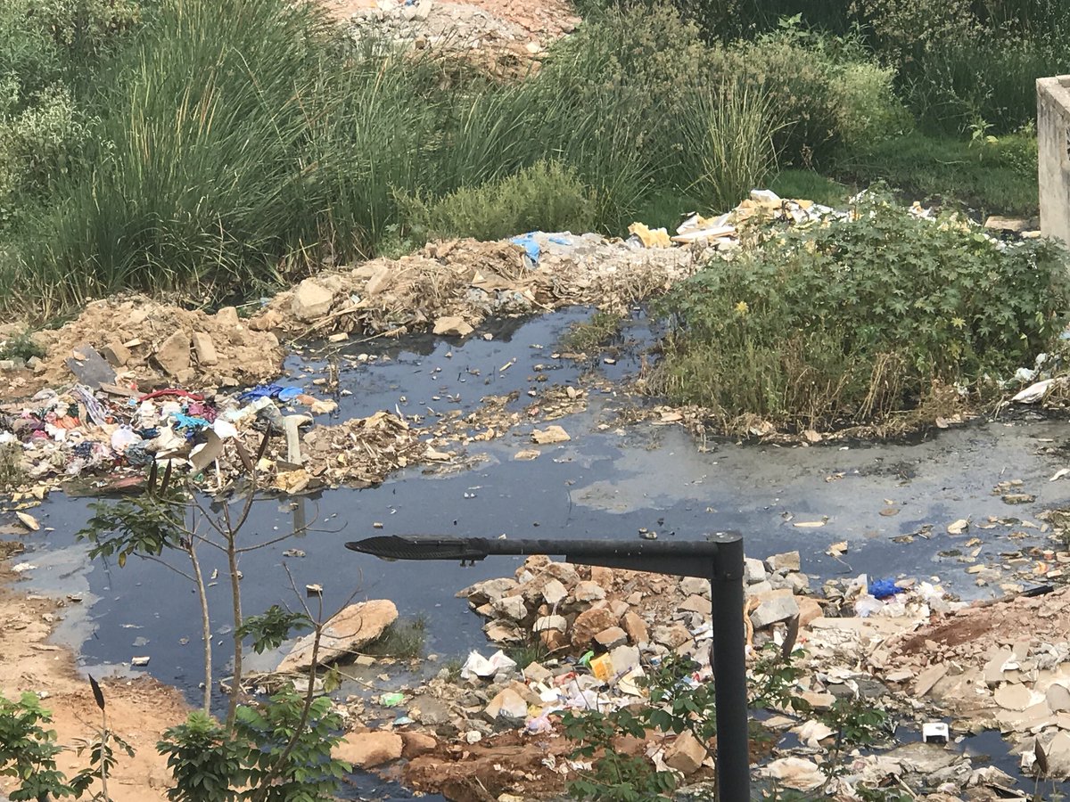 OwnersAsp's tweet photo. @mopr_goi illegal dumping of waste and open sewage lines right under the nose of hulimangala panchayat in Electronic City Phase 1 BANGALORE. No action despite repeated complaints. Please look into this. https://t.co/cBHnFbcLVT
