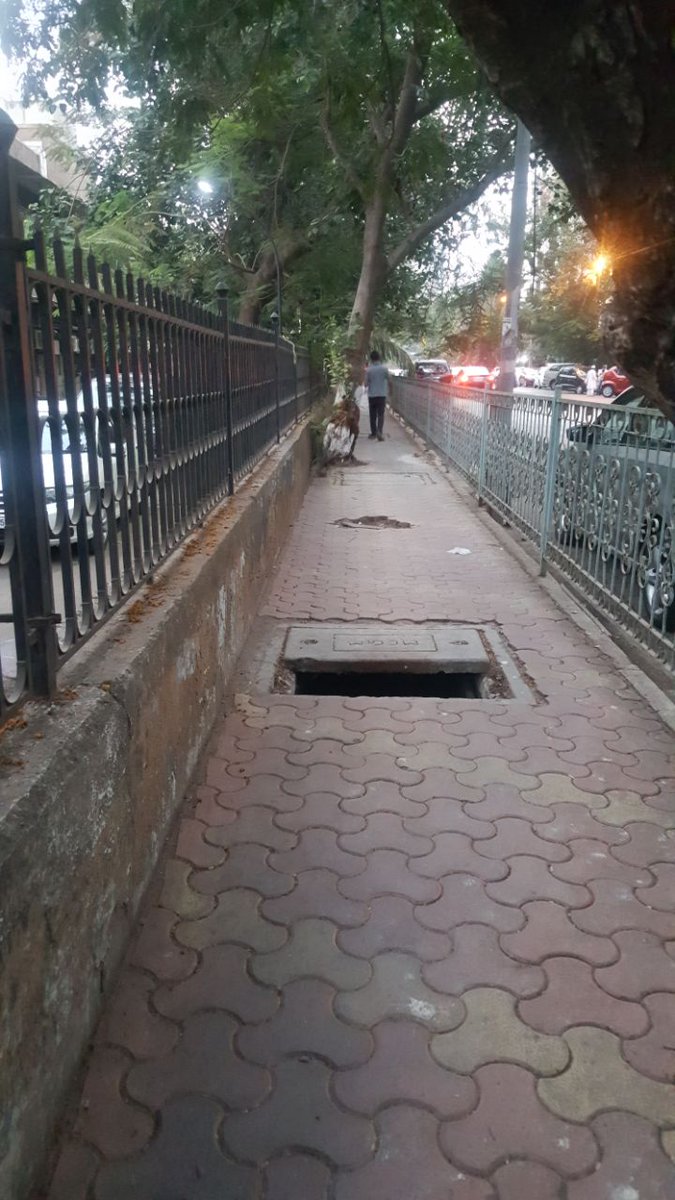 mk_08's tweet photo. Where did my tax money go? Down d hole. So many open manholes U can't use footpath at Sab TV road #lokhandwala #andheri #openmanhole #Dangerous #righttofootpath #citizensafety @MCGM_BMC @AmeetSatam @rohanrathodBJP @MumbaiMirror @Lokhandwala_Bom @hvgoenka @bmcmumbai @fayedsouza https://t.co/CjbasqPqum