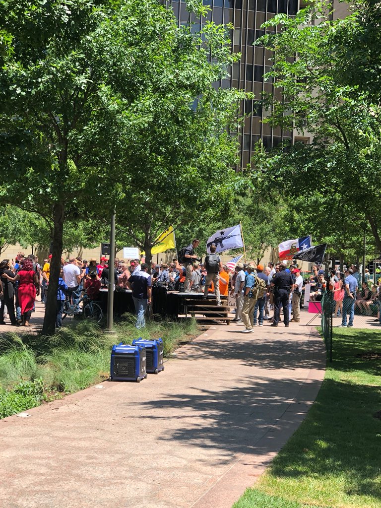 NoRA4USA's tweet photo. This is the armed @NRA crowd just after we had to evacuate a Parkland grad who they were harassing.  #NoRA https://t.co/FuCZzxzFNE