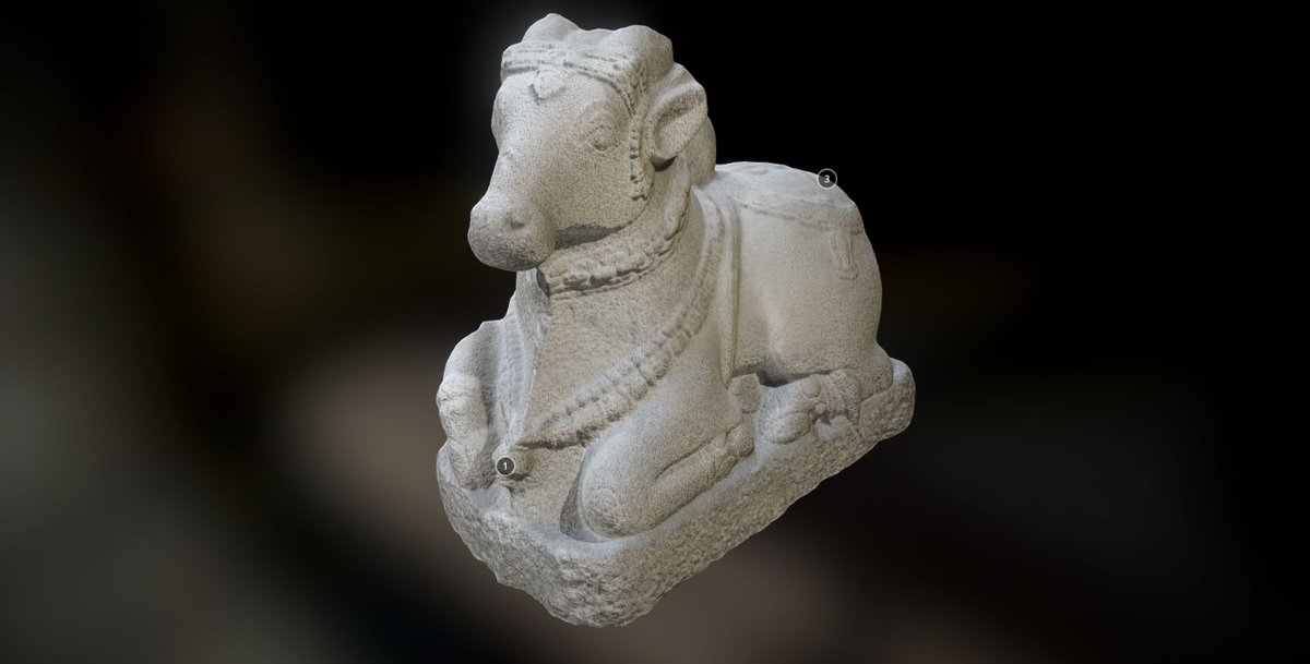 A Vijayanagara era granite Nandi held illegally at the british museum, london.  http://www.britishmuseum.org/research/collection_online/collection_object_details.aspx?objectId=248943&partId=1&searchText=nandi+bull&images=true&page=1