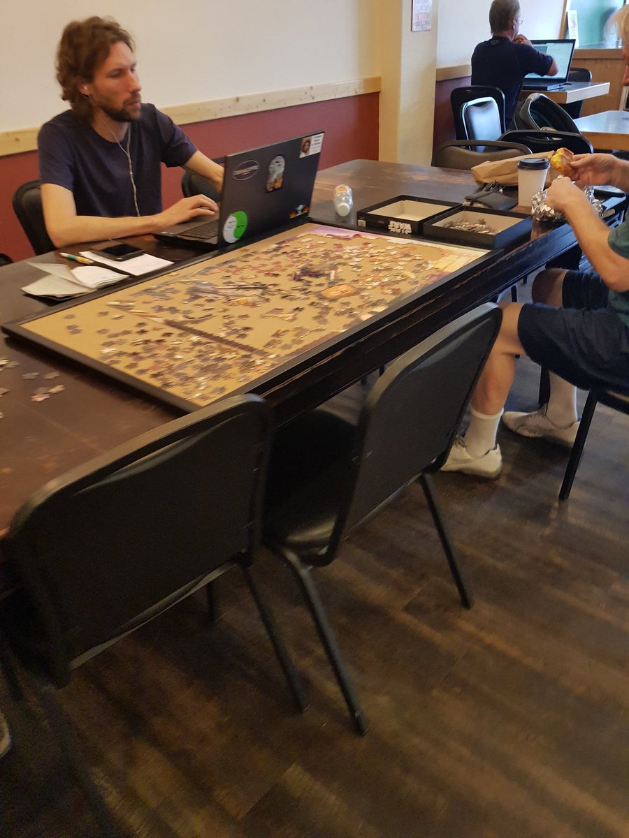 BarryLong1969's tweet photo. @adamcarolla @AdamCarollaShow I'M guessing this qualifies as another #dudeyoucanthangwith . A guy at a coffee shop in the middle of the day putting a puzzle together? SMH - hate or insanely jealous of? https://t.co/rZSJdfWnNw