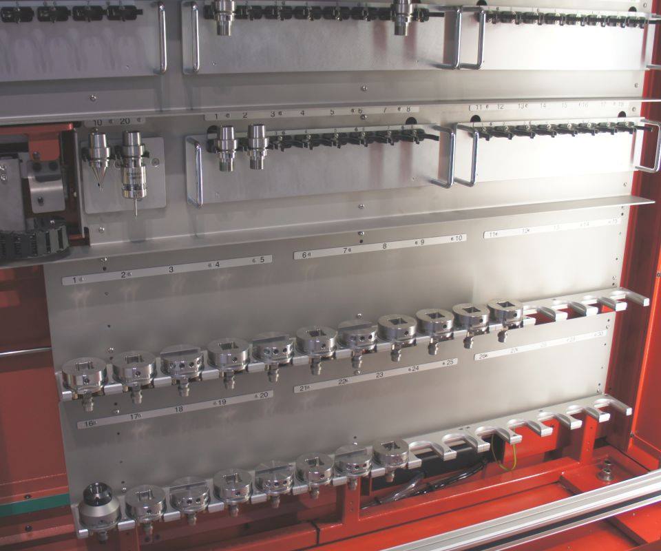 Save on robotics, or just add versatility, by integrating work changing with the tool changer.