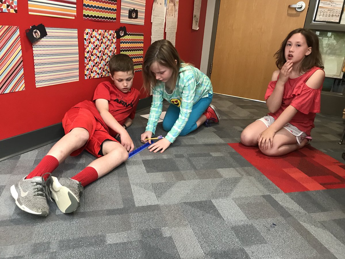 carriedirksen's tweet photo. 3rd graders @MGEWaukee “coding the building” today. Given a path to code from one place in the building to another. Using lots of math, critical thinking & problem-solving skills this am! Once their code is written they get to use Dash to follow it! #codeunplugged #CSforall https://t.co/QJq2Ii1xU7