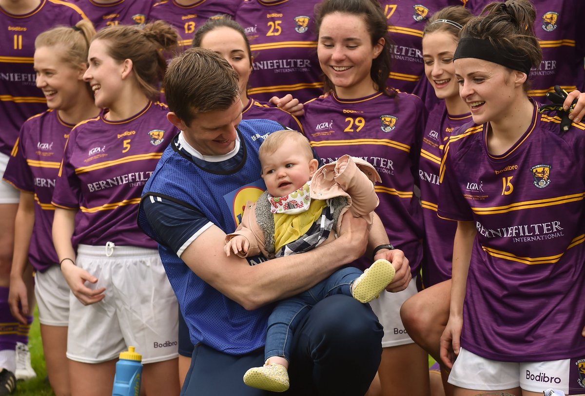 LadiesFootball's tweet photo. 👶 One of Wexford's youngest fans today was manager @antomasterson1's adorable daughter Caragh! ☺️

🏆Caragh joined in the celebrations, and found a spot in the cup, as the Slaneysiders claimed the @lidl_ireland Division 3 title!

#SeriousSupport

(📸 pics via @SportsfilePOM) https://t.co/PadfC7JXtK