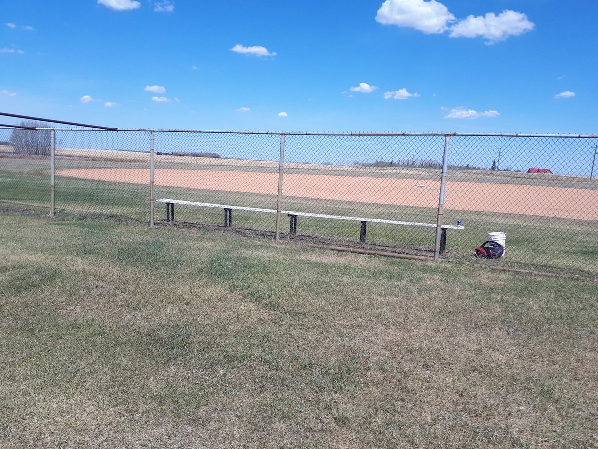 Heisler boys doing a little tune up on the Field of Dreams. Won't be needing that no more. Now what about some dugouts...