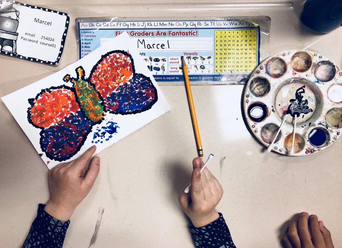 1st grade pointillism butterflies are beautiful!  🦋