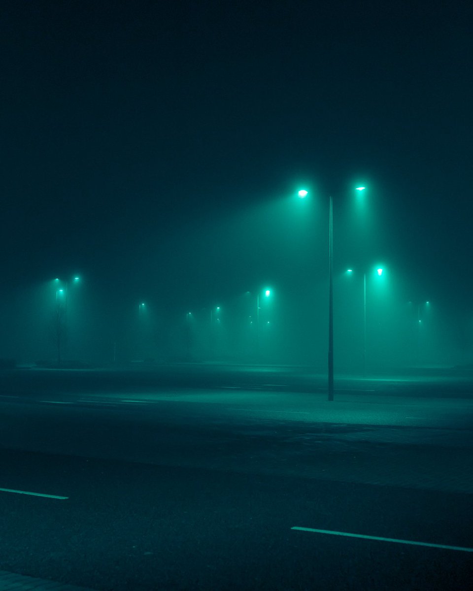 thisiscolossal's tweet photo. Dystopian Images Explore a Foggy Irish Town Drenched in Aquamarine Light https://t.co/8Vl6uv3Aam https://t.co/Xhw1fBNqpK
