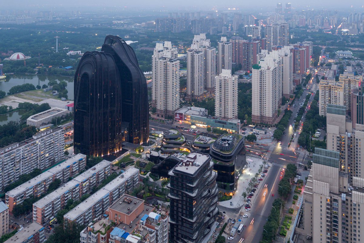discoverbeijing's tweet photo. Chaoyang Park Plaza, Beijing.
Photos capture the relationship between the city of Beijing and the Chaoyang Park Plaza skyscraper, designed by MAD Architects,the studio headed by architect Ma Yansong.They offer an image of architecture in its urban setting. https://t.co/NcgTrWgwIJ https://t.co/8qWcYi9vC7