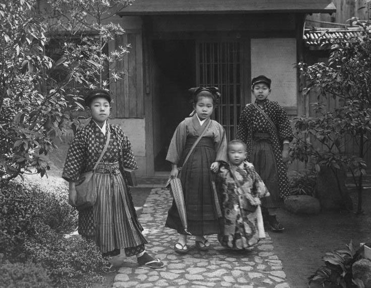 An illustration: these children leaving home for school ca. 1900 in Japan, would be considered destitute by modern standards, but judging from what I can see in this photo alone, they are richer than almost everyone I know: large loving family, well kept beautiful healthy home...