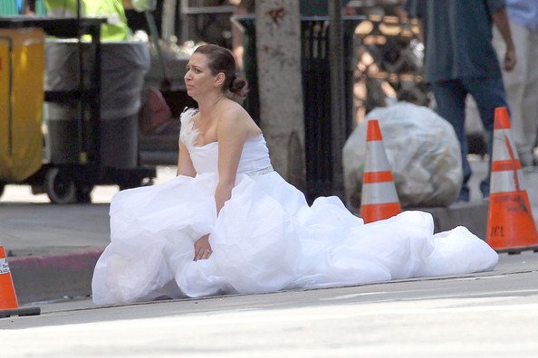Miss @ArianaGrande 's #redcarpet pose reminds me a lot of @MayaRudolph pose  in her Lady St. Petsois JuJu wedding dress in #bridesmaid ! #metgala  #metgala2018 #heavenlybodies #poophappens
