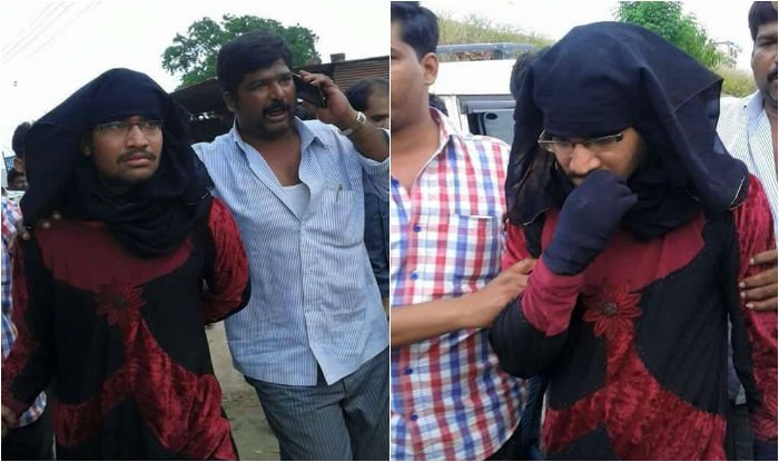 Burqa-clad alleged RSS activist caught throwing beef inside temple goes viral  http://www.india.com/news/india/burkha-clad-rss-activist-caught-throwing-beef-at-temple-pictures-go-viral-on-facebook-593154/