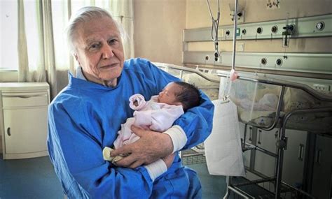 43. Here is David Attenborough holding a newborn baby human. #AttenboroughDay #Attenbirthday