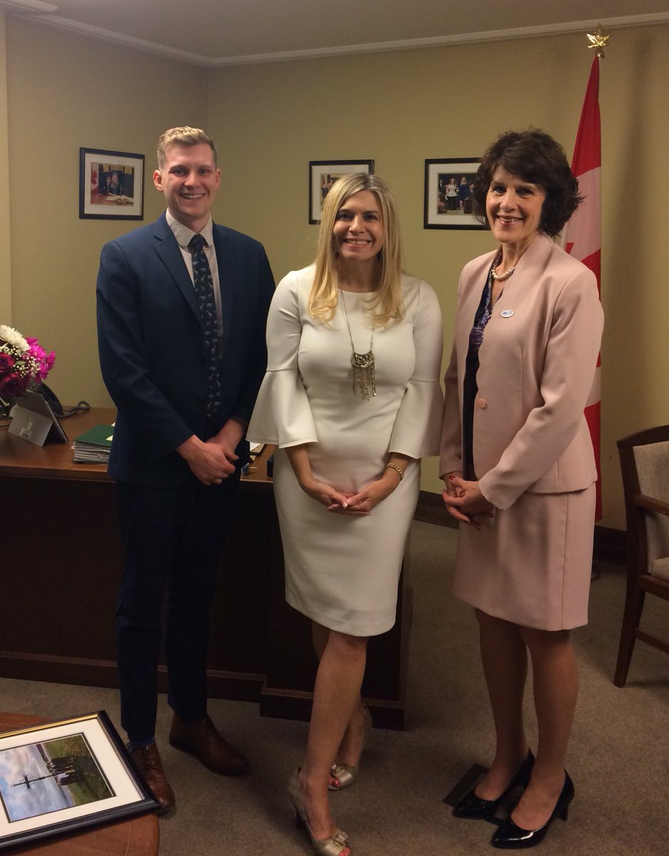 L-R: CNIB’s Thomas Simpson, MP Stephanie Kusie and CAO Executive Director Laurie Clement stand for a photo.