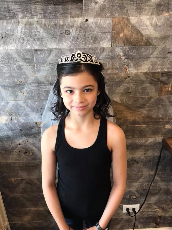 What a doll! This princess had her first communion this past weekend, and our very own Sarah had the best time styling her hair for the big event!