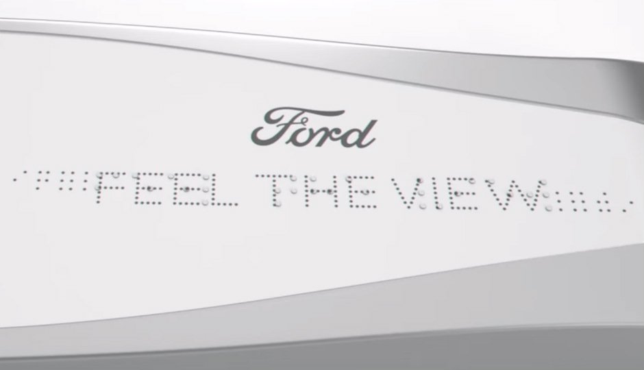 Alphapointe's tweet image. #TechnologyTuesday: @Ford develops haptic vibration-based #Braille mechanism, #FeelTheView to describe scenery from car window for the visually impaired: bit.ly/2FFcR3i