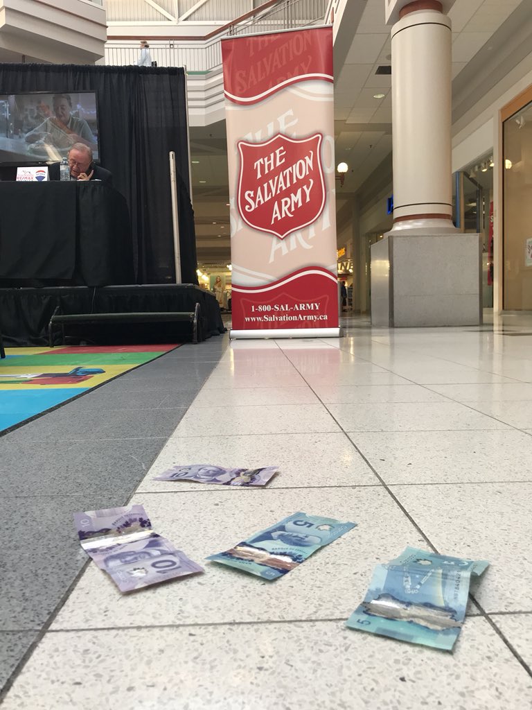 SalvationArmyNL's tweet photo. We’ve got money falling from the second floor of The Village Shopping Centre thanks to generous people passing by. #SANLRadiothon #NLHopes https://t.co/ui0A6V9OA4